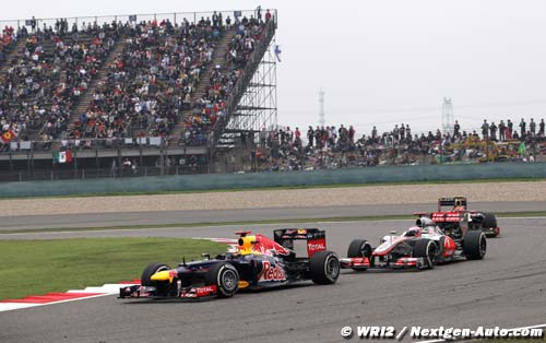 Vettel shrugs at F1's 'crazy
