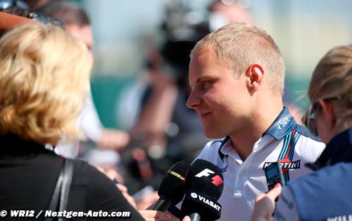 Wolff says Bottas to wear 'blue or