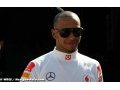 Hamilton raises eyebrows with 'garish' outfits