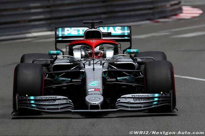 Hamilton takes pole and heads Mercedes