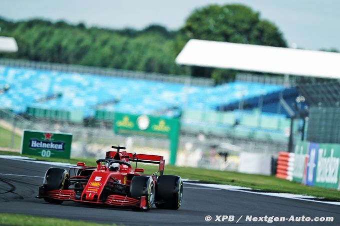 Vettel says Ferrari not slowing him down