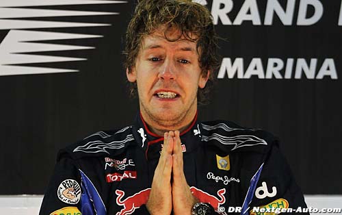 Champion Vettel happy without a manager