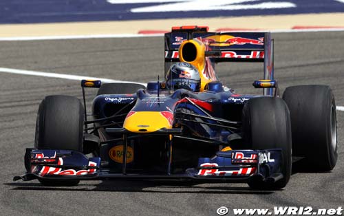 Vettel storms to pole position