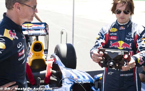 Tom Cruise jumps into an F1 car