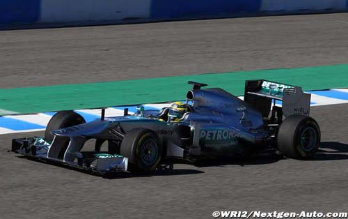 Hamilton watches Rosberg debut 2013 car