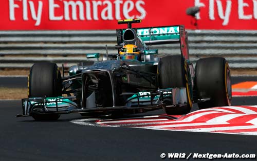 Hamilton snatches pole in Hungary