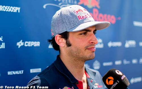 Sainz smiling as he 'suffers'