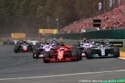 Vettel pounces to beat Hamilton to Belgian Grand Prix win