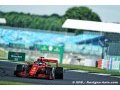 Vettel says Ferrari not slowing him down