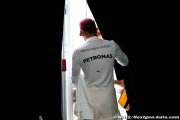 Absent Hamilton booed in London