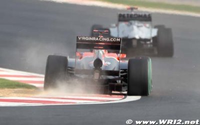 Glock s’incline face à la Lotus de Trulli