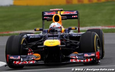 Vettel receives time penalty after controversial overtake on Button