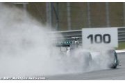 Lewis Hamilton takes pole at damp Shanghai