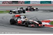Press hails Hamilton, Alonso, after Sepang struggles