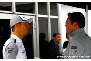 McLaren 'happy' to keep Button for 2015