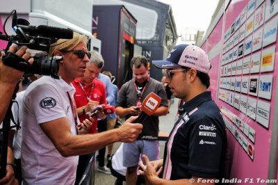 Force India racing on amid administration
