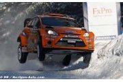 Henning Solberg rolls on Rally Sweden