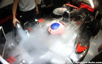 McLaren eyes Vettel but Button wants to stay