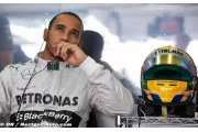McLaren denies 'throwing' Hamilton out of pits