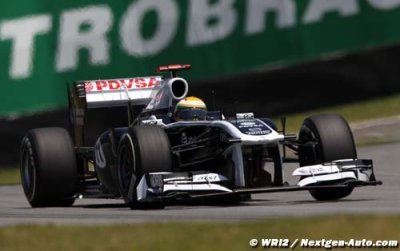 Barrichello juggling five phones to extend F1 career