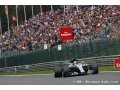 Hamilton holds Vettel at bay to claim victory in Belgium