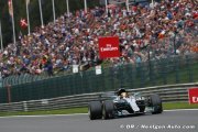 Hamilton holds Vettel at bay to claim victory in Belgium