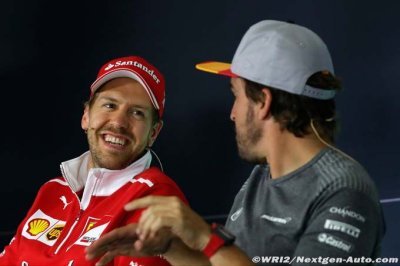 Carey wants F1 ’hero’ Vettel to stay