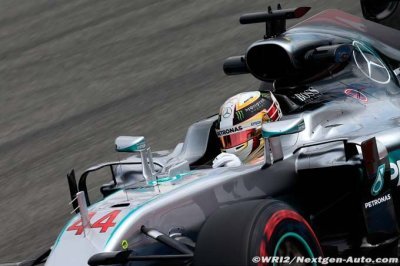 Hamilton not angry but plays down Spa win
