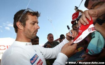 Loeb beats Rossi to Monza glory