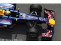 Webber signs with Red Bull for 2011