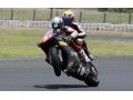 Webber enjoys wheelie on grand prix motorbike
