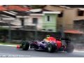 Vettel flies to pole in wet qualifying
