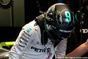 Rosberg back to winning after helmet change