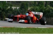Alonso F1's shock leader at soggy Sepang