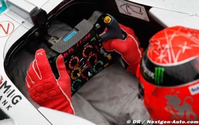 Michael Schumacher struck with puncture during practice two