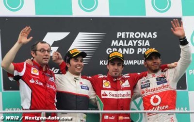Alonso holds off heroic Perez to win rain struck Malaysian GP
