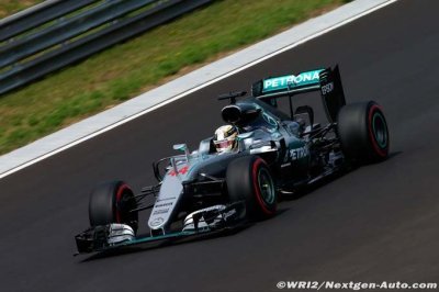 Hamilton wins in Hungary to take F1 championship lead