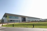 Partial sale to value Aston Martin team at $2.6bn