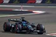 Russell plays down title contender status