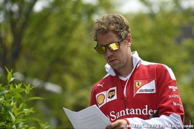 Vettel plays down risk of F1 driver strike