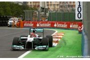 Schumacher holds on to podium finish 