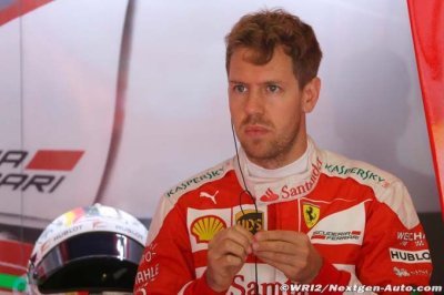 Ferrari pushing over limit to catch Mercedes - Vettel
