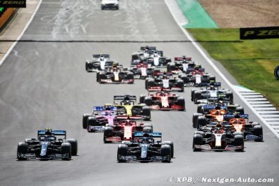 Hamilton survives late puncture to win British Grand Prix