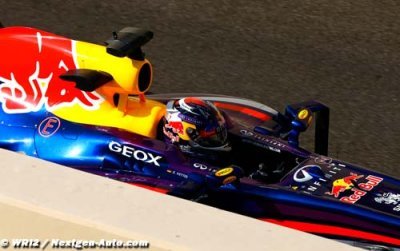 Vettel marks fourth title with gold helmet
