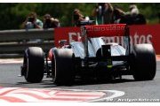 McLaren admits race win unlikely in 2013