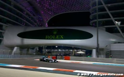 Hamilton takes second title with win in Abu Dhabi