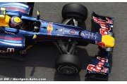 Webber signs with Red Bull for 2011