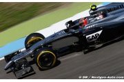 Magnussen en deuxième ligne, Button éliminé en Q2