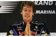 Champion Vettel happy without a manager