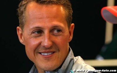 Schumacher hints intention to race in 2013